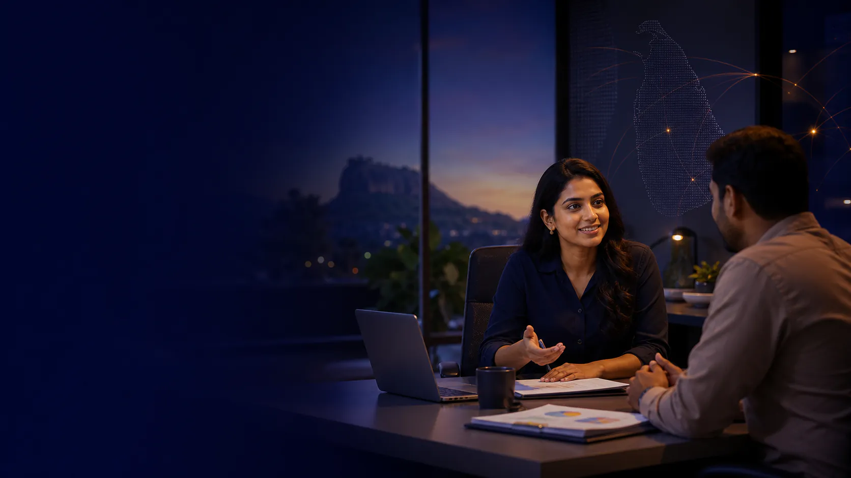 A Migo Lanka adviser discussing a customer requirement